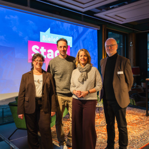 Adult Blazer Coat Crowd Female Glasses Groupshot Jacket Male Man People Person Shoe Woman